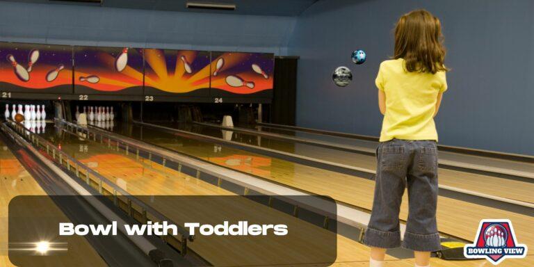 Young girl bowling at a colorful bowling alley, demonstrating bowling with toddlers